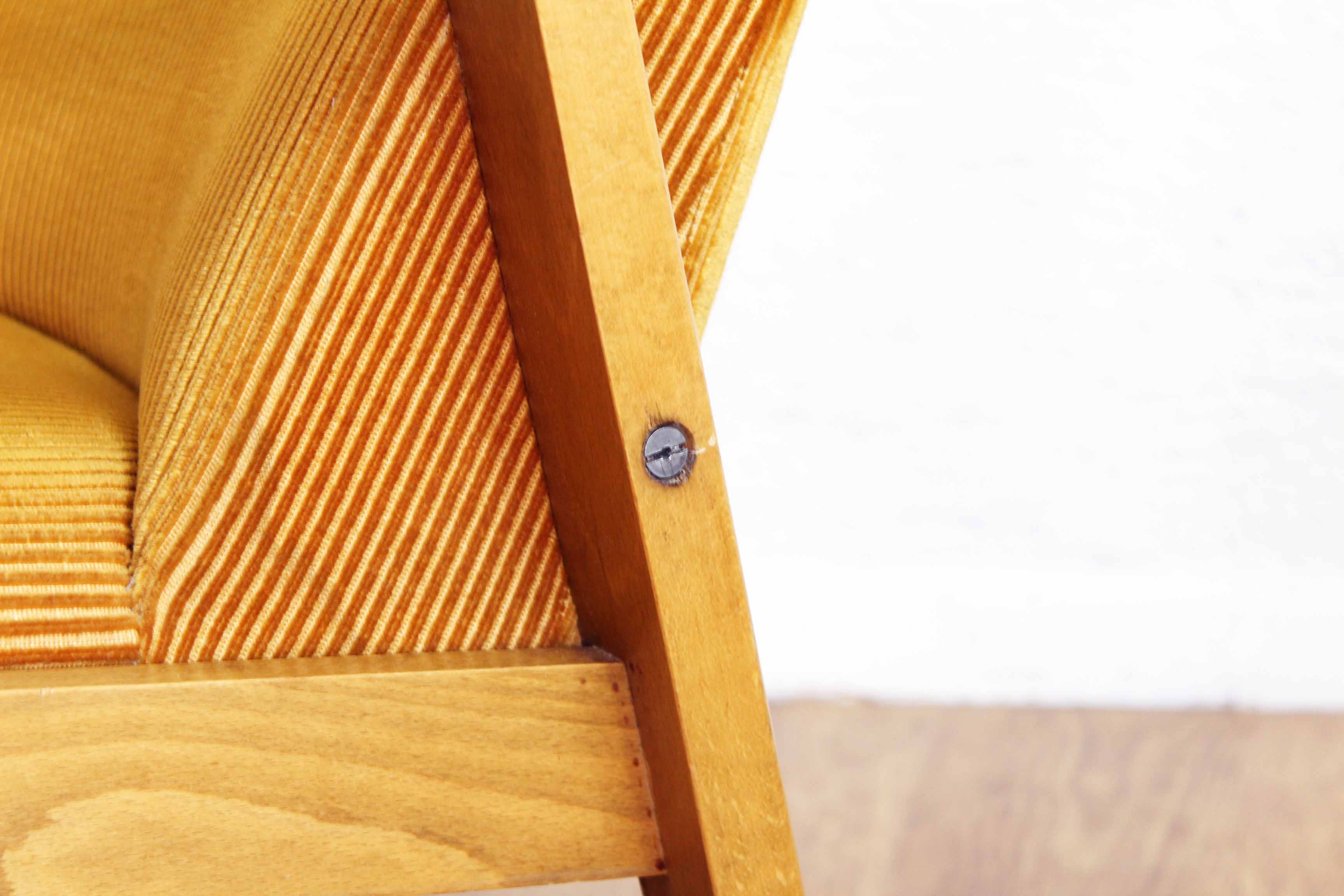 Scandinavian-designed chair in solid beech and mustard velvet