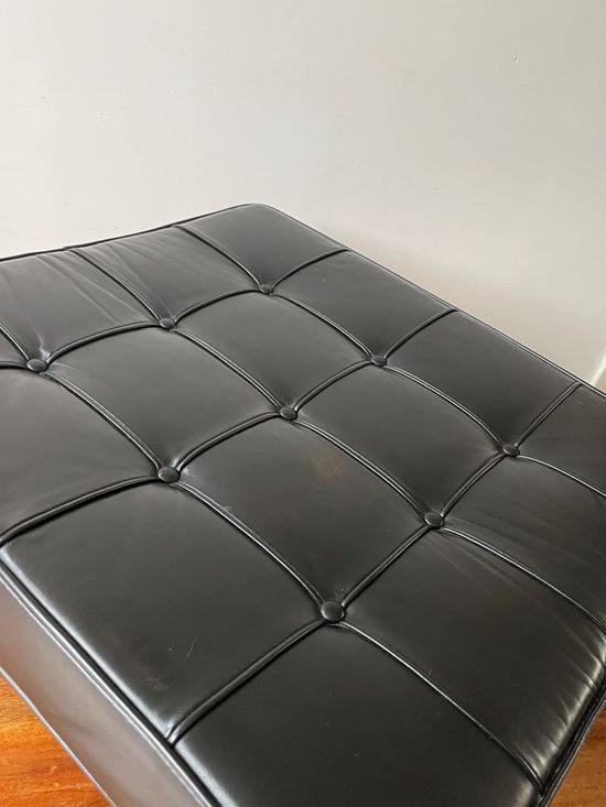 Vintage leather ottoman stool