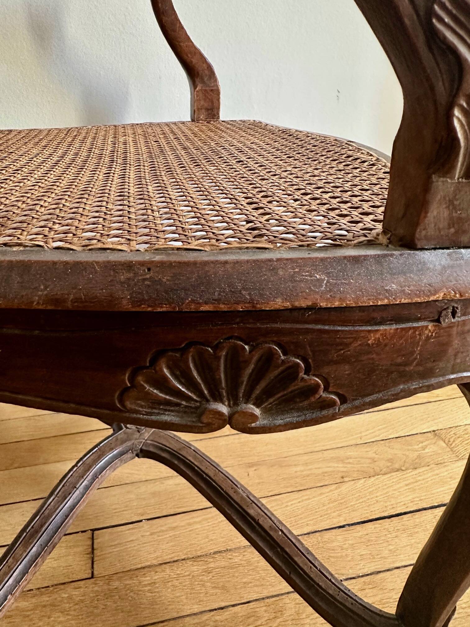 A pair of Regency armchairs with a stretcher.