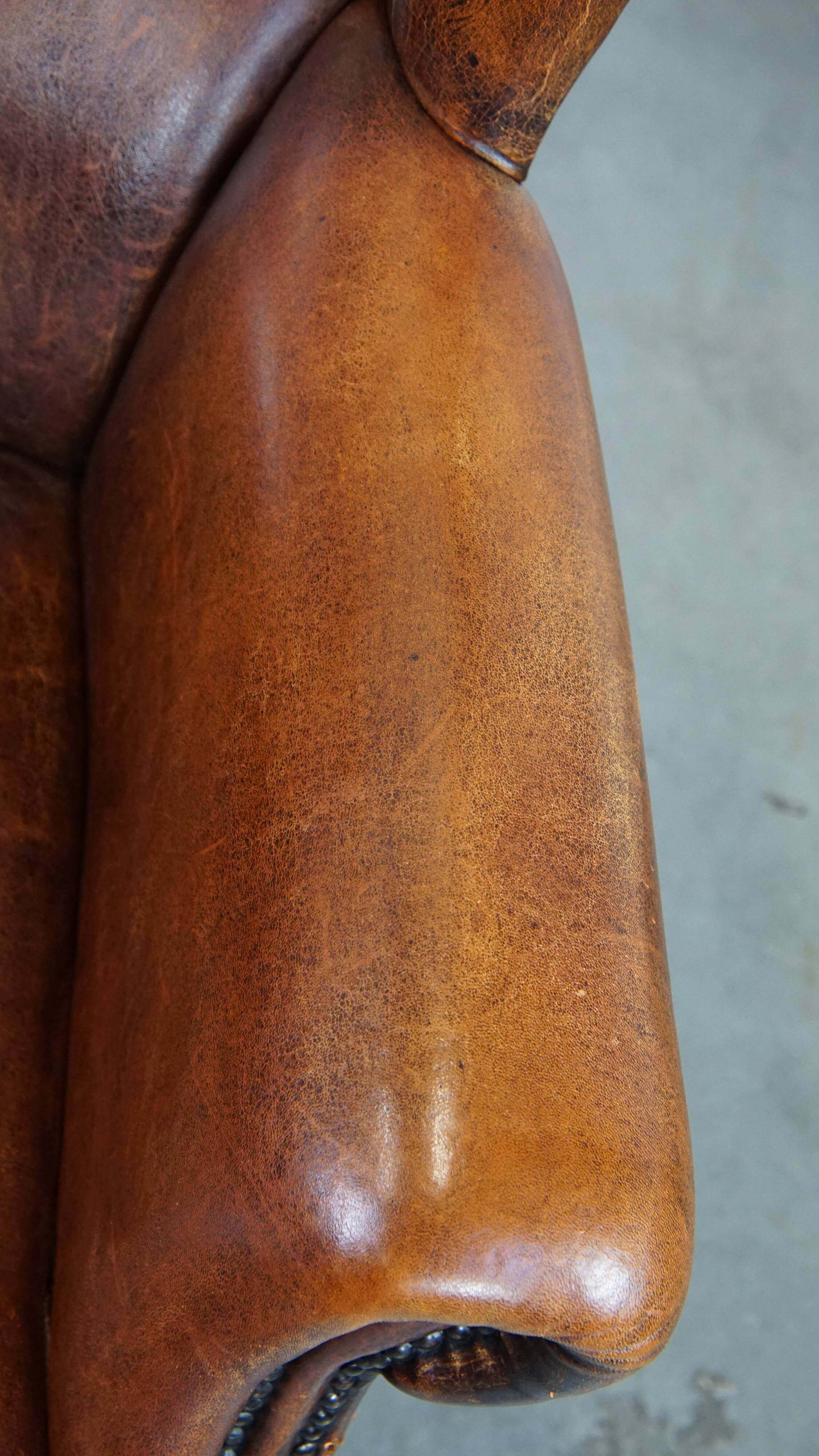 Vintage sheep leather wingback chair