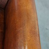 Vintage sheep leather wingback chair