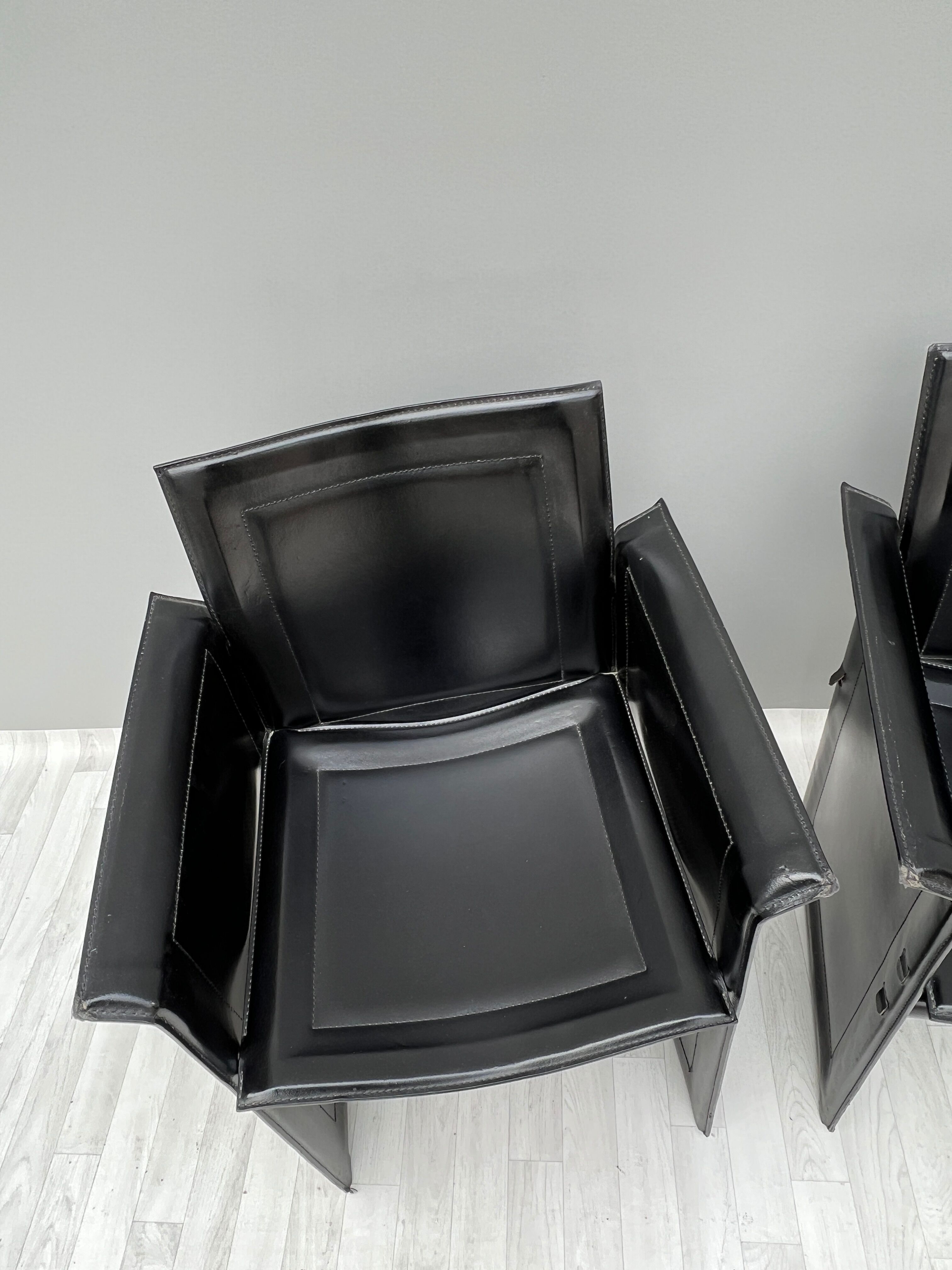Pair of armchairs in black leather