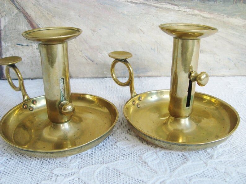 Pair of old brass candlesticks