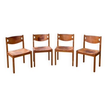 Suite de 4 chaises vintage en bois et cuir patiné – années 1970
