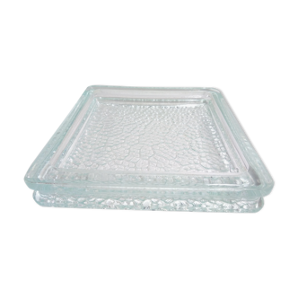 Empty pocket paved with modernist glass