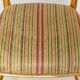 Pair of golden wood chairs in a bamboo style.