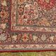 Tapis ancien en laine à dominante rouge - 200 x 305 cm