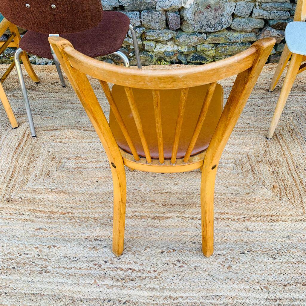 Set of 8 mismatched chairs