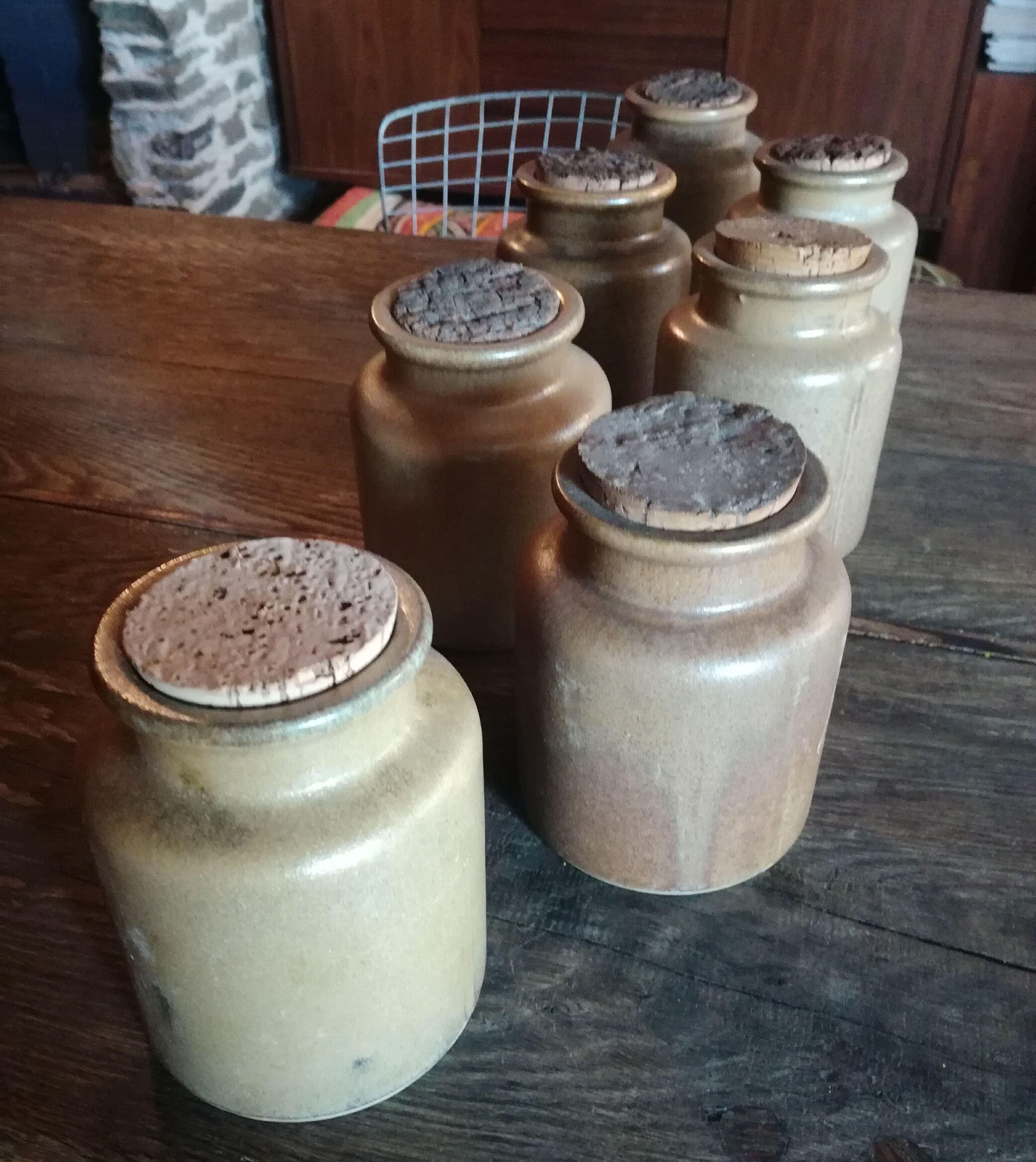 Lot of seven sandstone spice pots