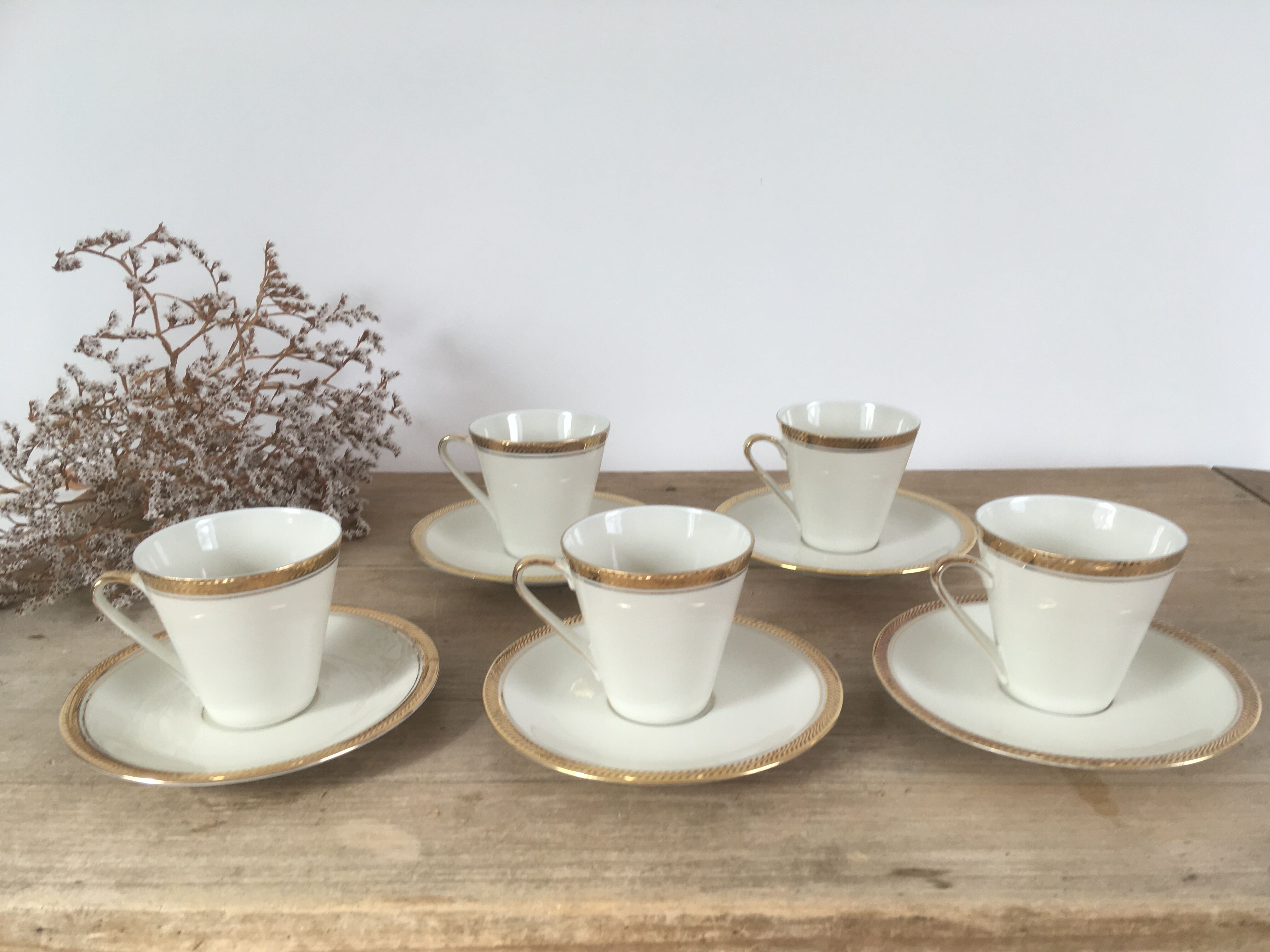 White & gold porcelain coffee cups