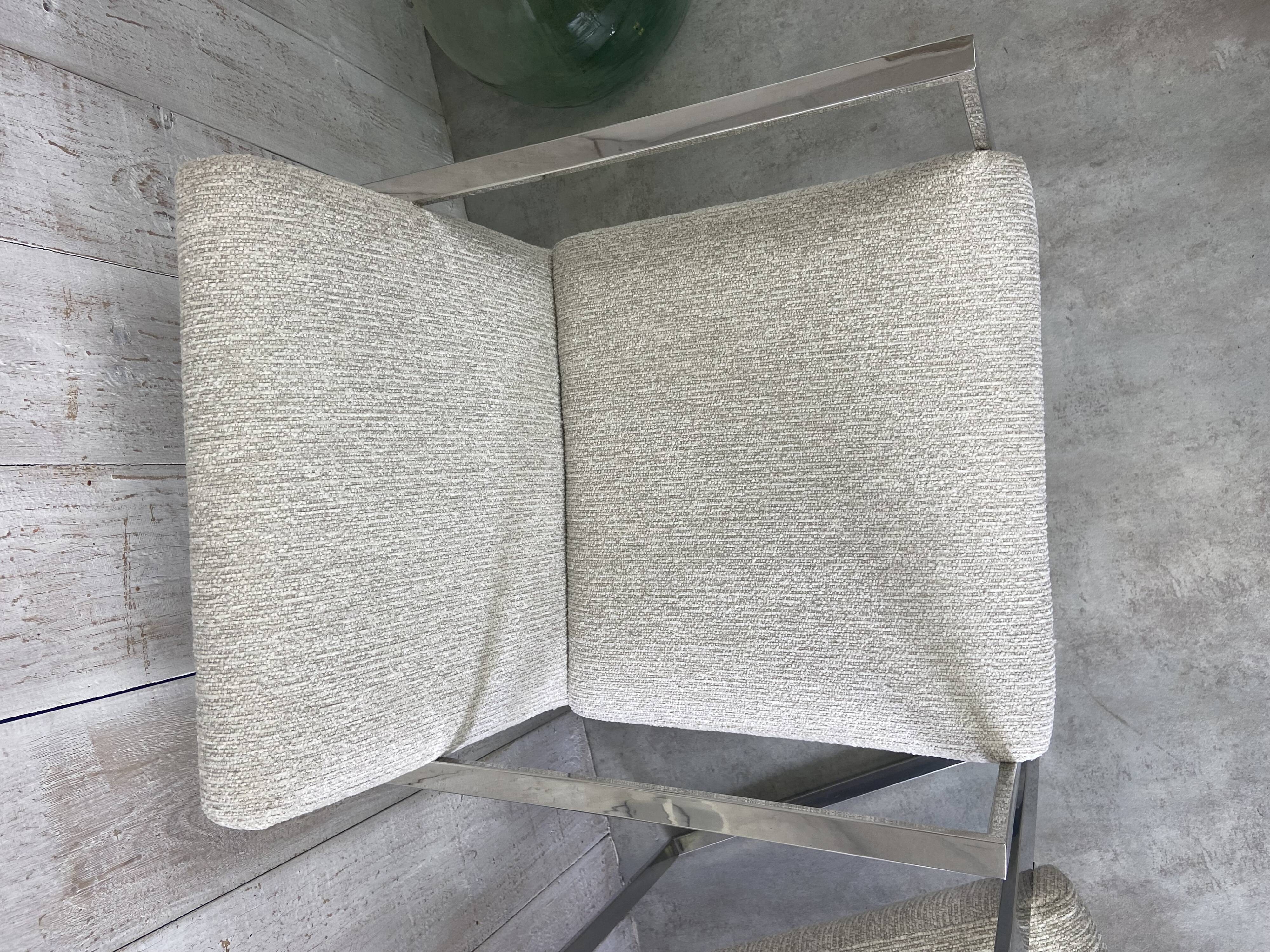 Pair of stainless steel armchairs from the 70s