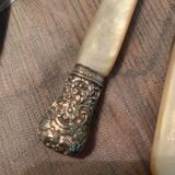 Set of coat of arms fruit cutlery