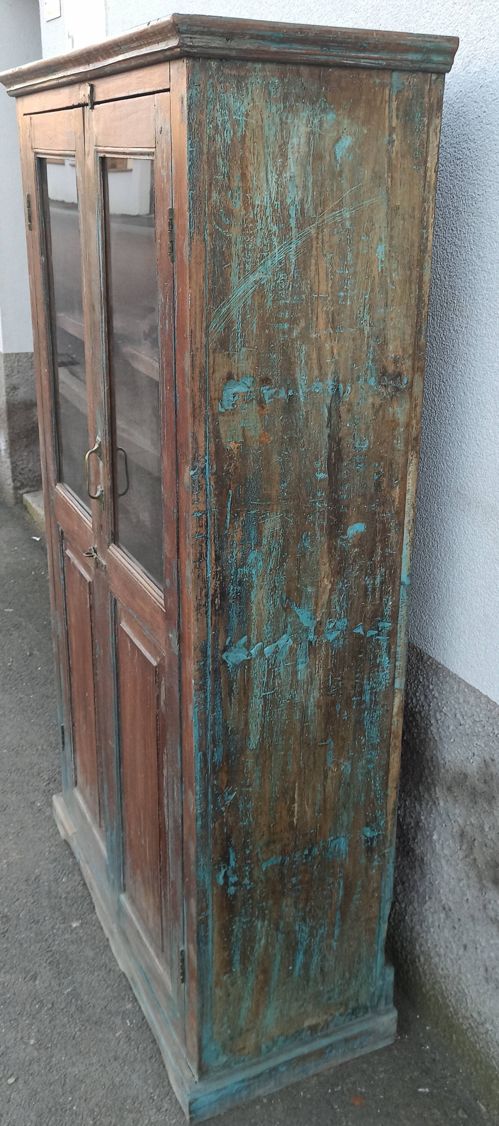 Old glazed wooden cabinet with beautiful patina