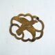 Brass bird trivet
