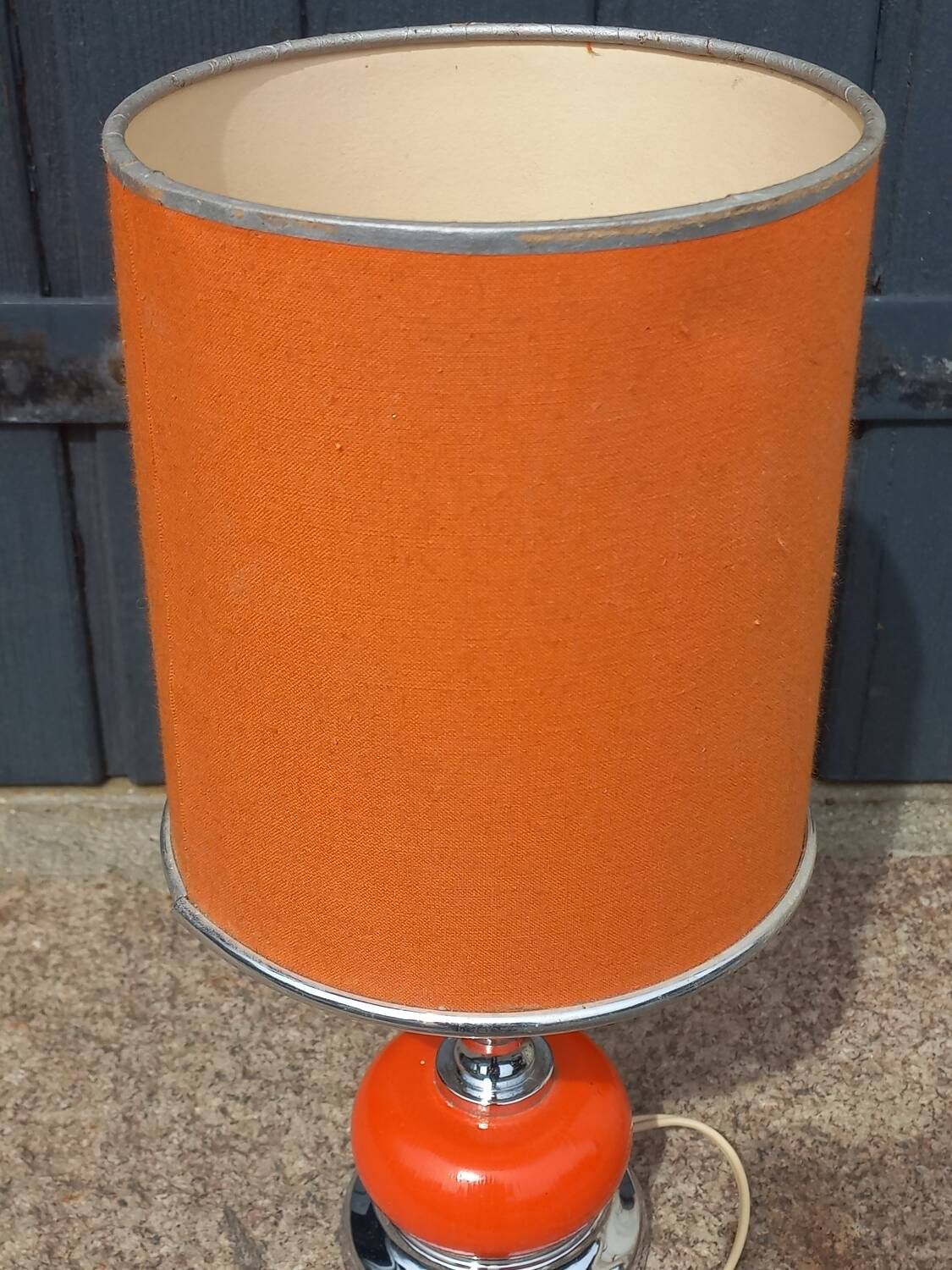 Designer lamp from the 70s in chrome metal and orange lacquered wood