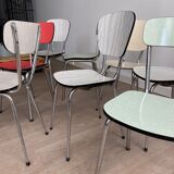 10 mismatched multicolored Formica chairs 60s