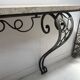 Console de style Art Déco en fer forgé martelé XX siècle