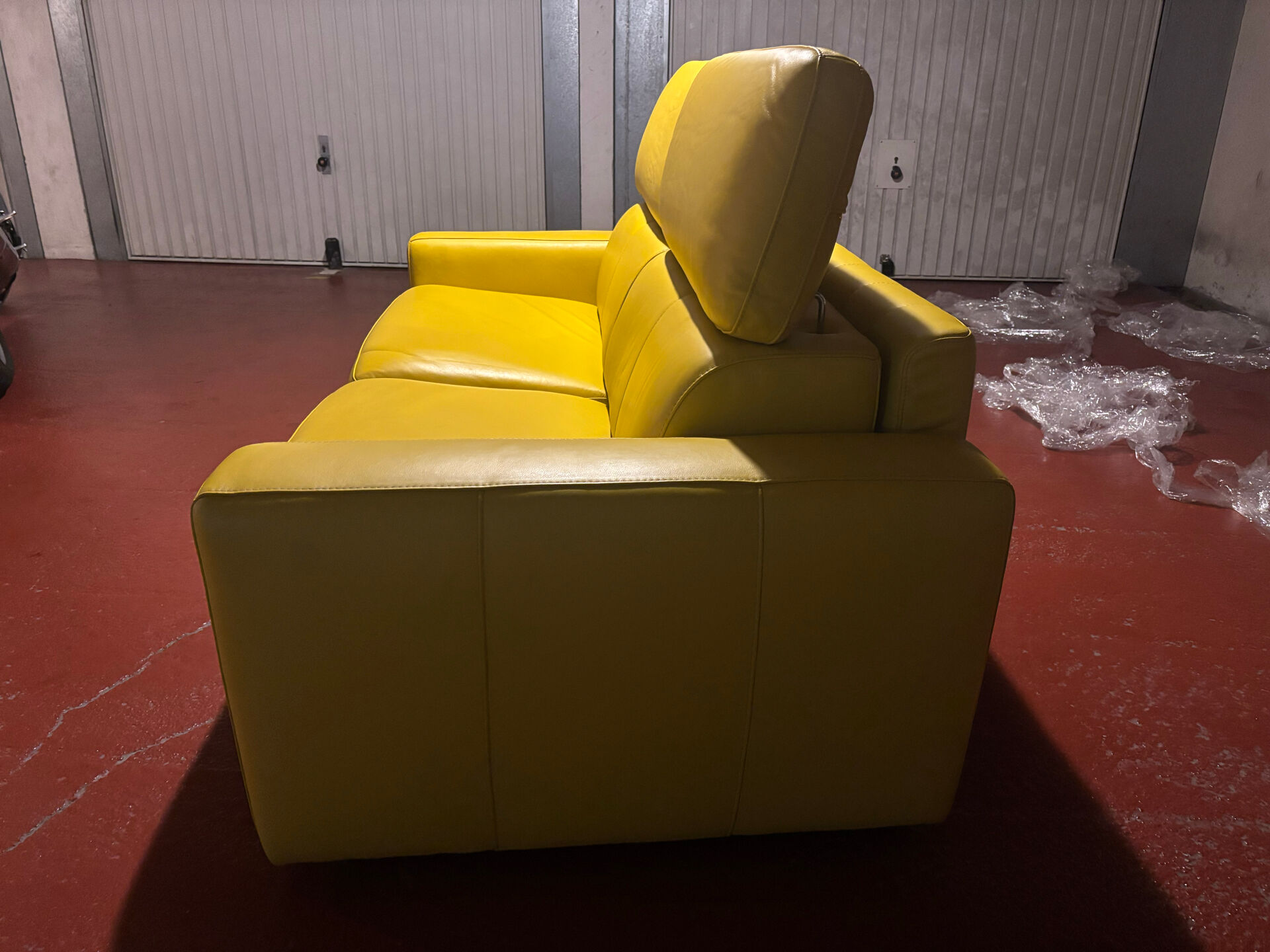 Yellow leather convertible sofa made in Italy.