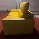 Yellow leather convertible sofa made in Italy.