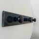 Vintage wall-mounted coat rack in lacquered wood from the 60s