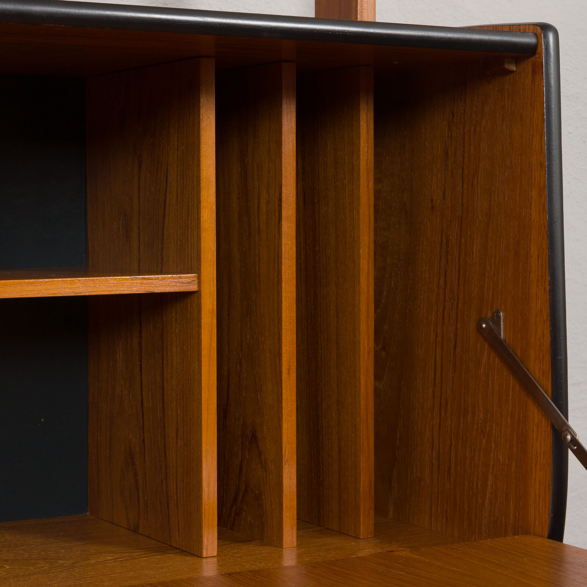 Scandinavian free standing vertical bookcase with a secrtetaire or home office wall unit model Ergo,