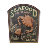 Former Seafood restaurant sign in rare relief