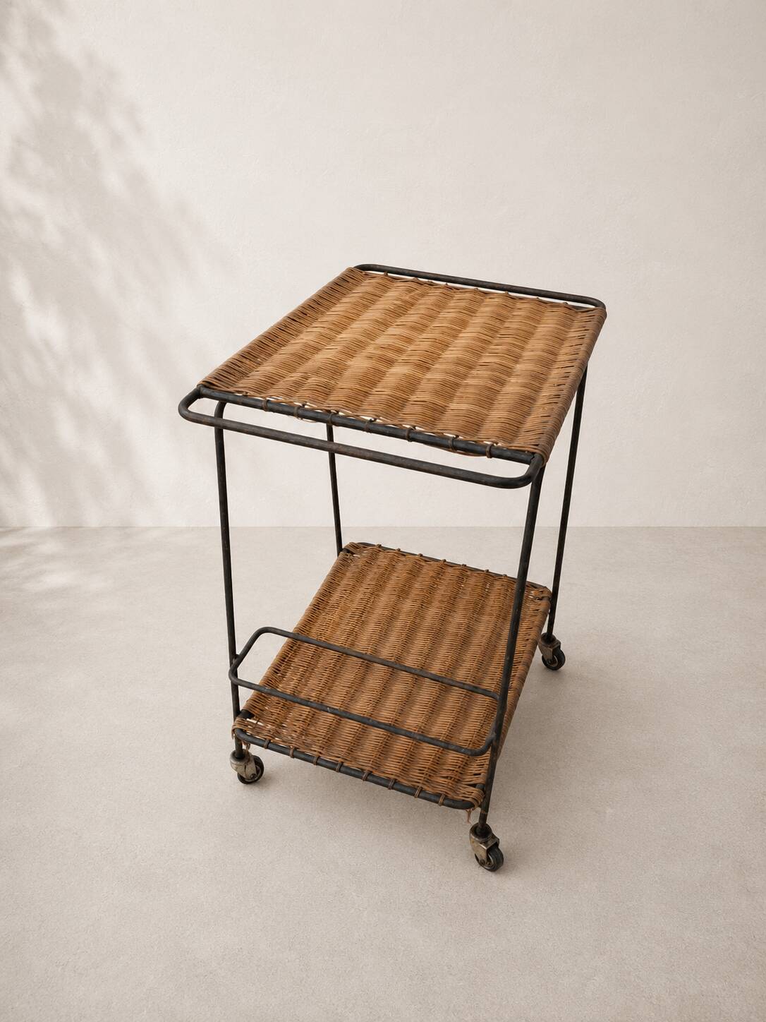 Vintage rolling dessert trolley in rattan and black metal – 1950s/60s