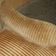 Howard & Sons / Chairs Ltd two-seater canapé with feather-filled cushions.