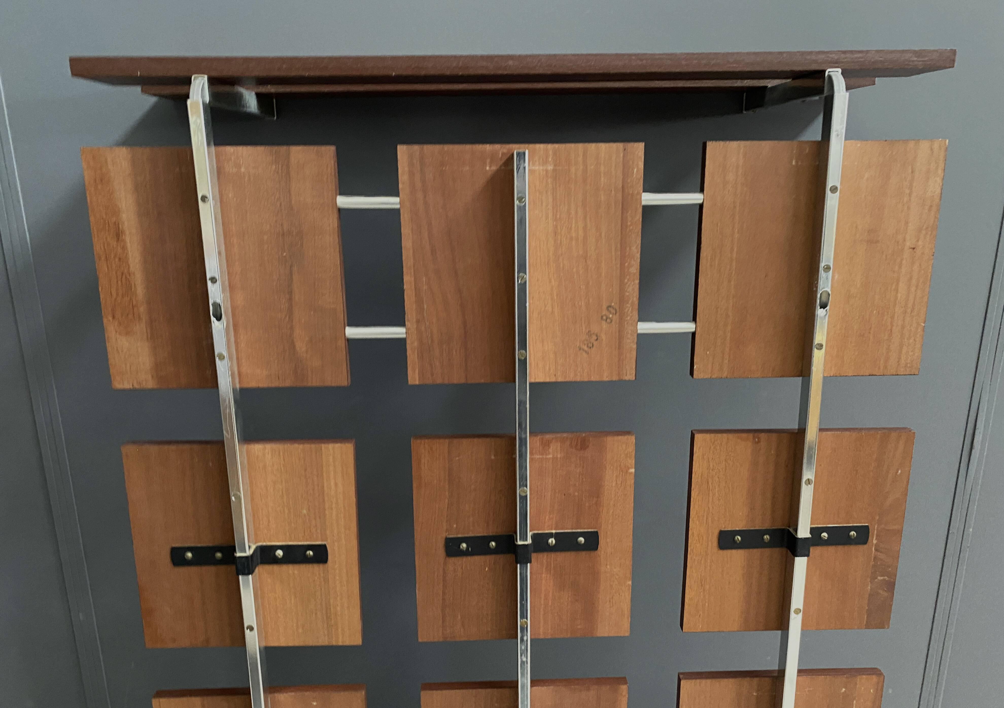 Coat rack wall unit in palisander wood veneer and chrome 1960s