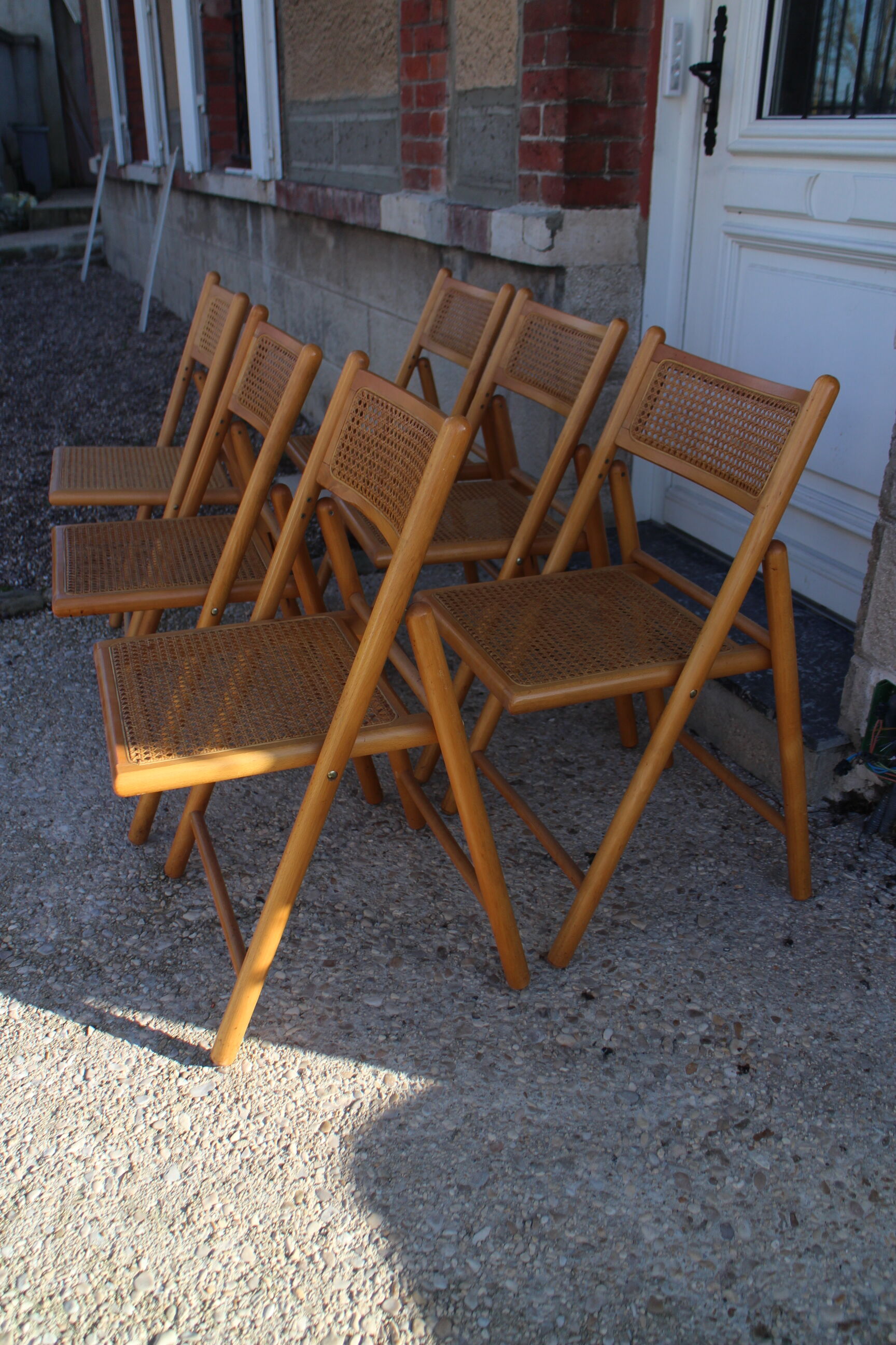 Series of 6 folding chairs canned