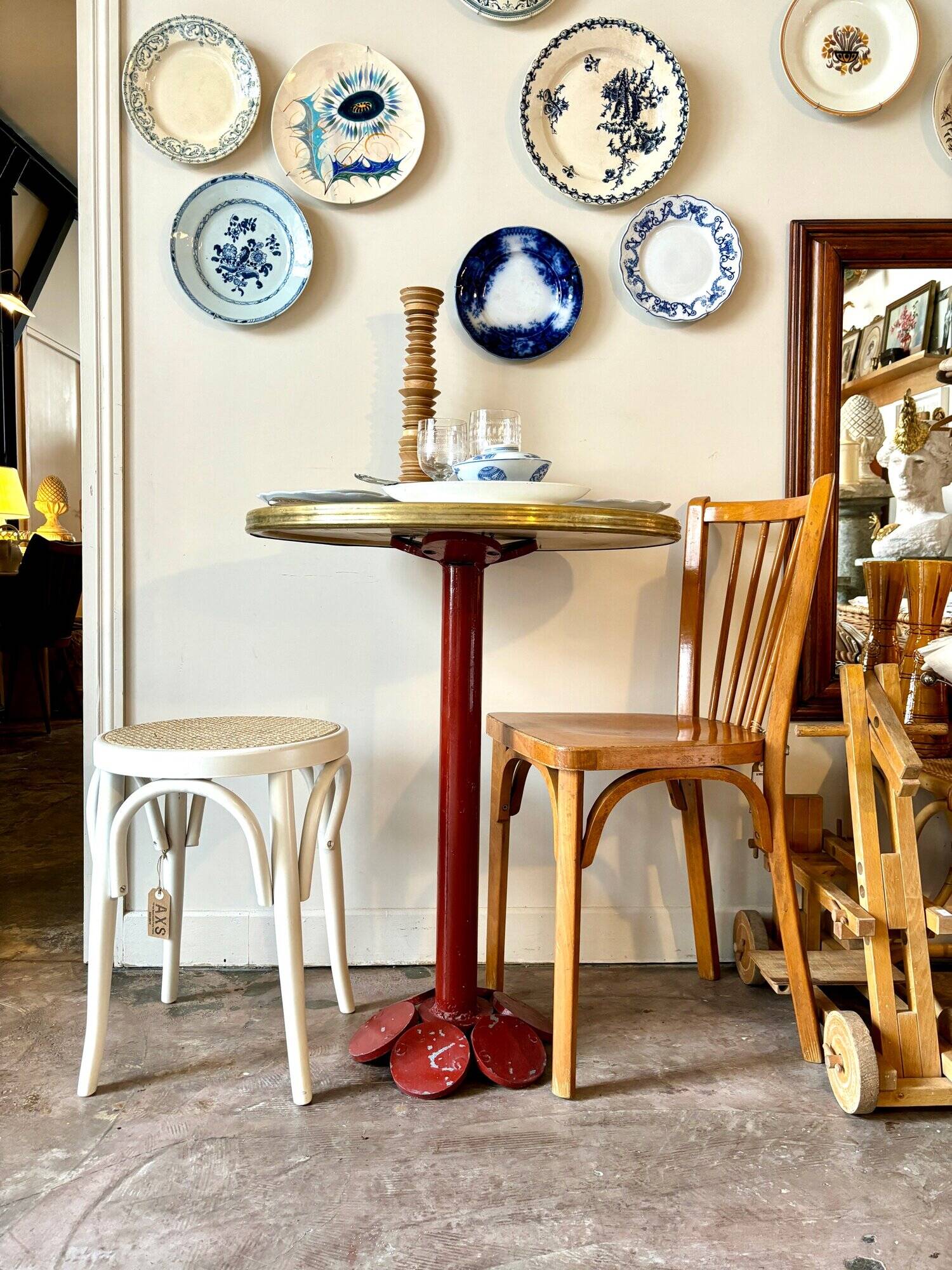 Bistro table in burgundy metal and beige melamine
