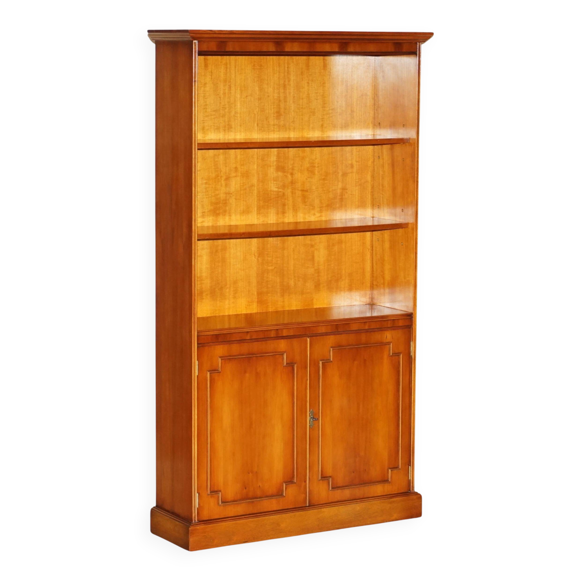 Open library Bradley Furniture made of yew wood with a cupboard base.