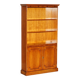 Open library Bradley Furniture made of yew wood with a cupboard base.
