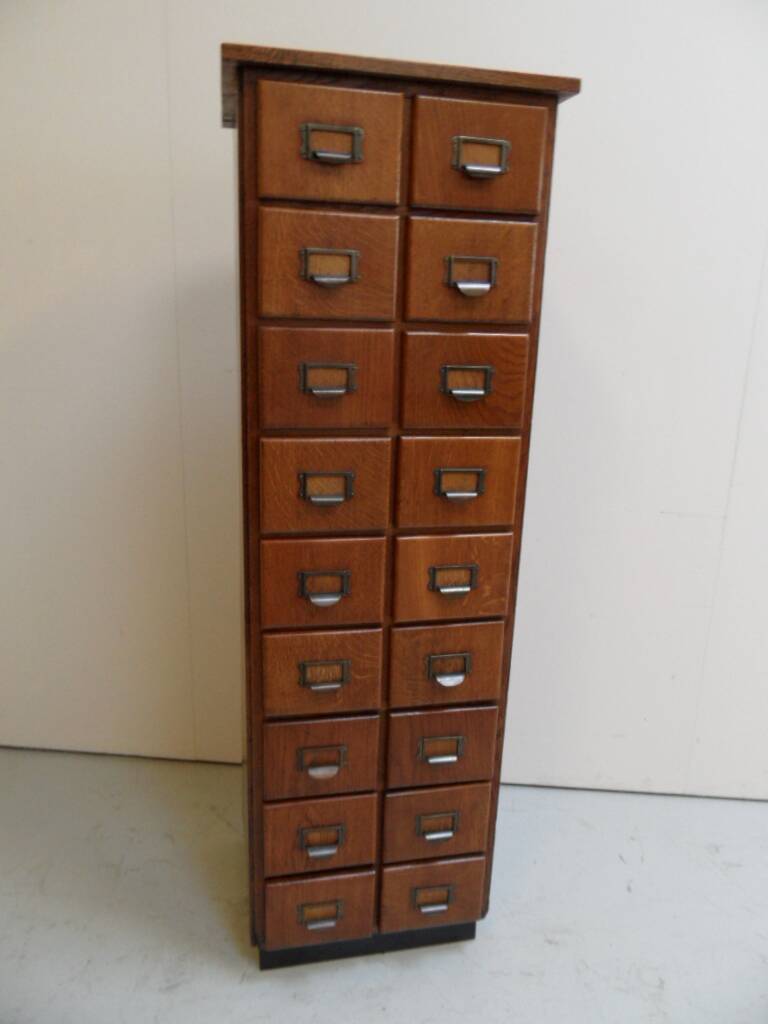 Antique oak apothecary cabinet with drawers