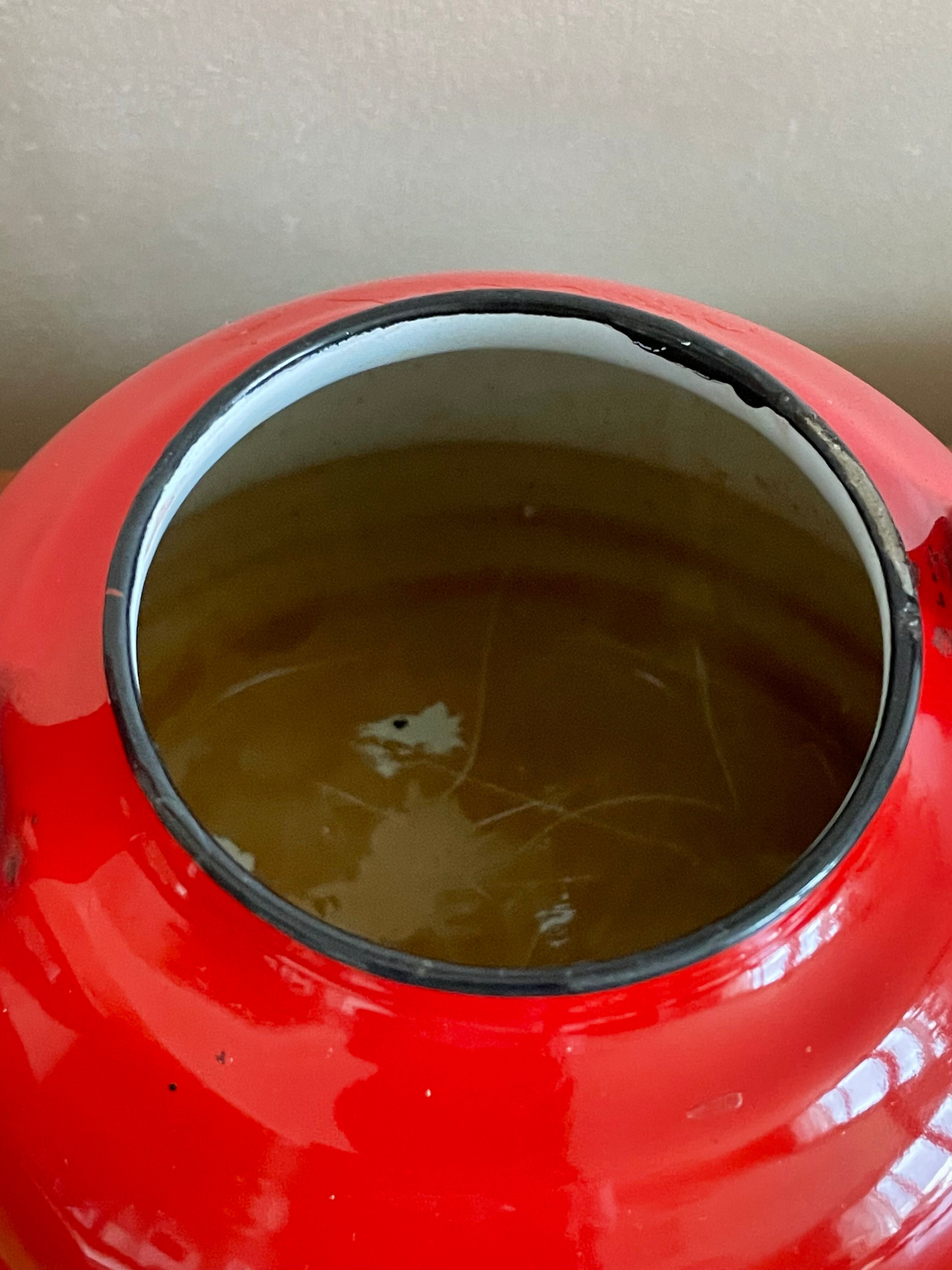 Red enamelled teapot