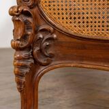 Louis XV style bed in carved and caned beech