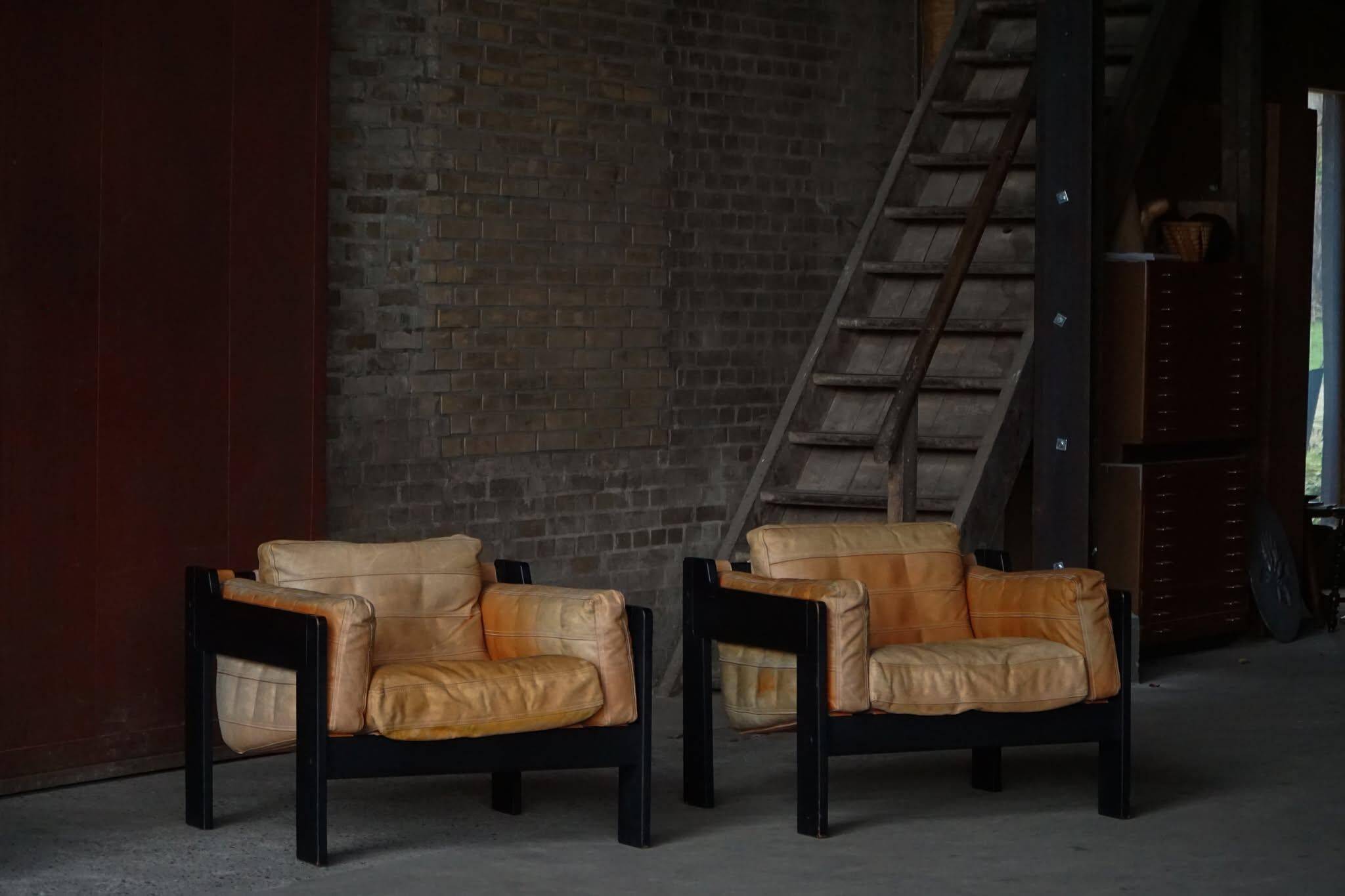 Pair of Easy chairs by Rud Thygesen & Johnny Sørensen in wood and leather, 1970s.