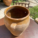 Ancient terracotta pottery jar