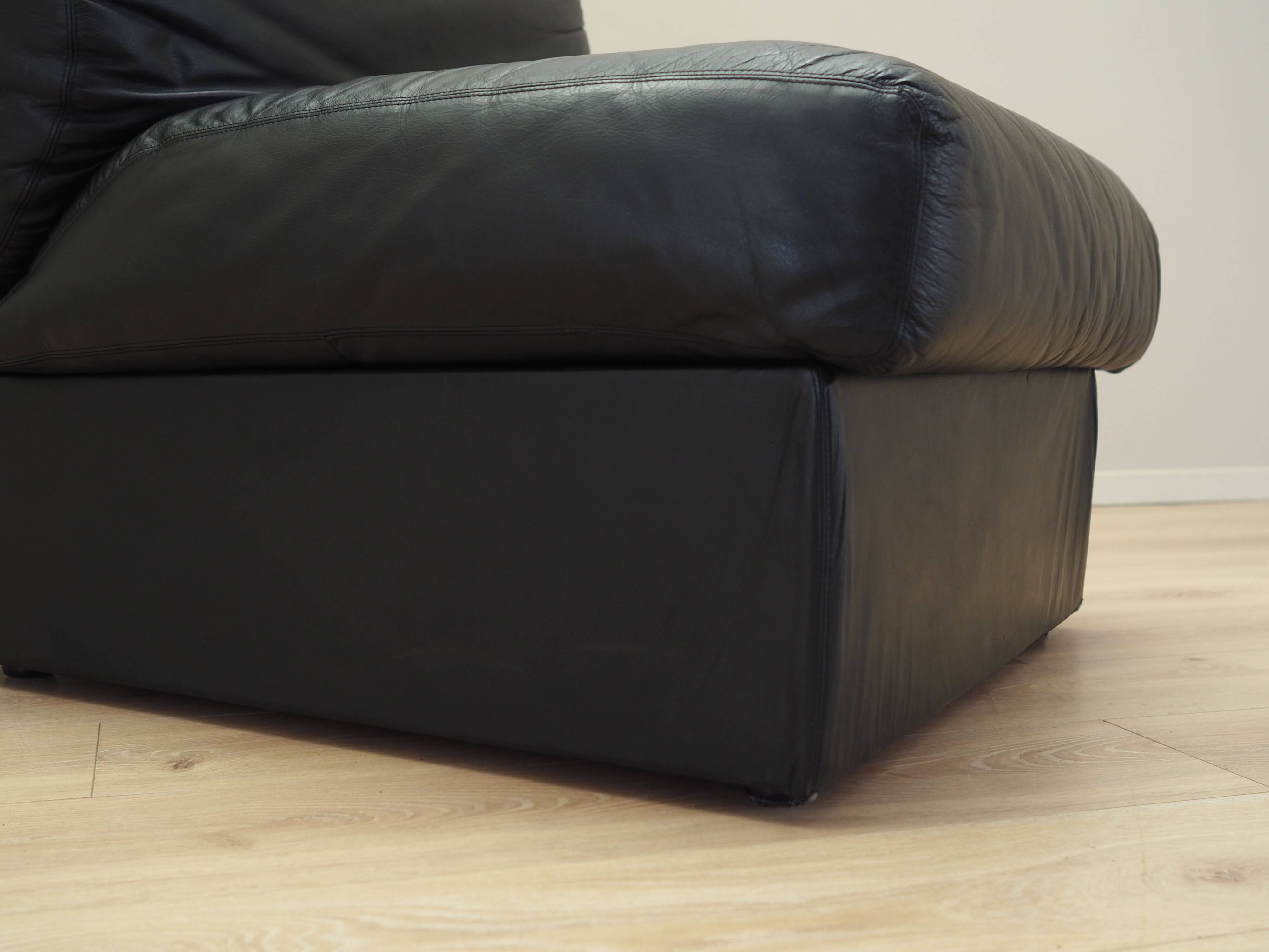 Black leather pouffe/armchair, Italian design, 1960s, production: Italy