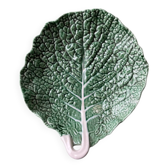 Large hollow dish with green cabbage leaf slip