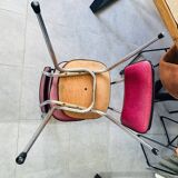 Pair of raspberry-colored chairs from the 60s/70s with metal legs