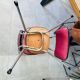 Pair of raspberry-colored chairs from the 60s/70s with metal legs