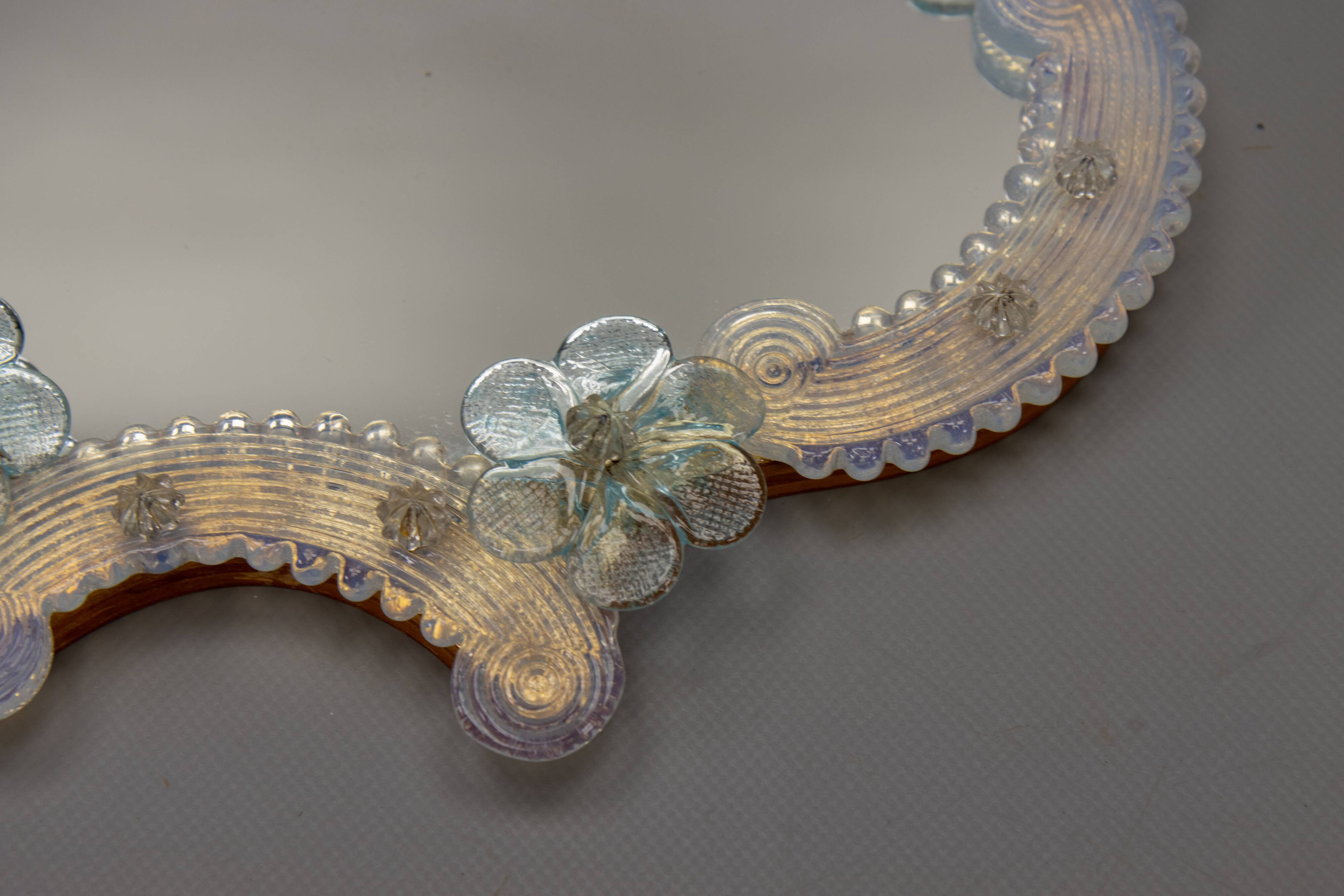 Italian Venetian Murano light blue and opalescent glass wall mirror, 1950s