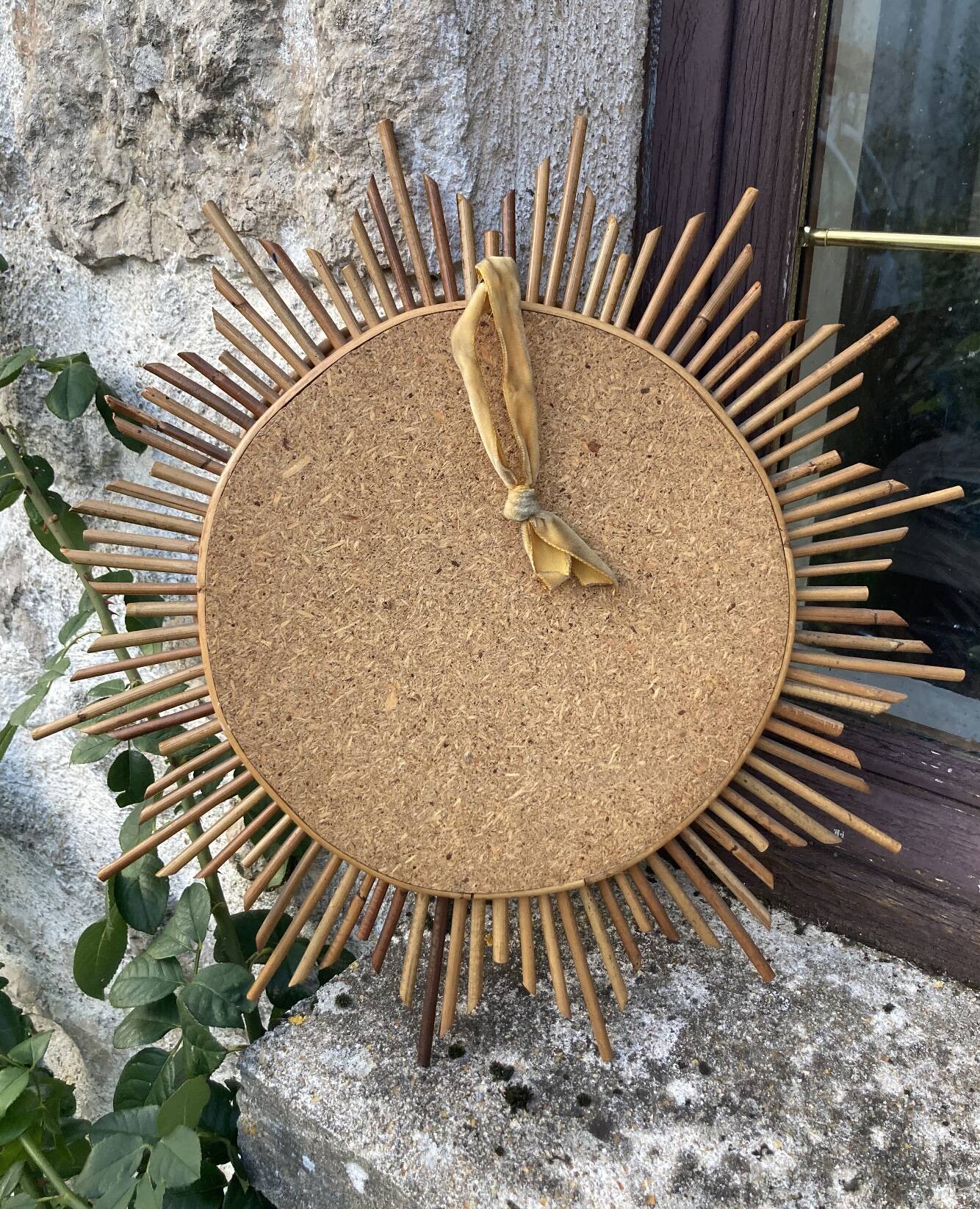 Vintage rattan sun mirror