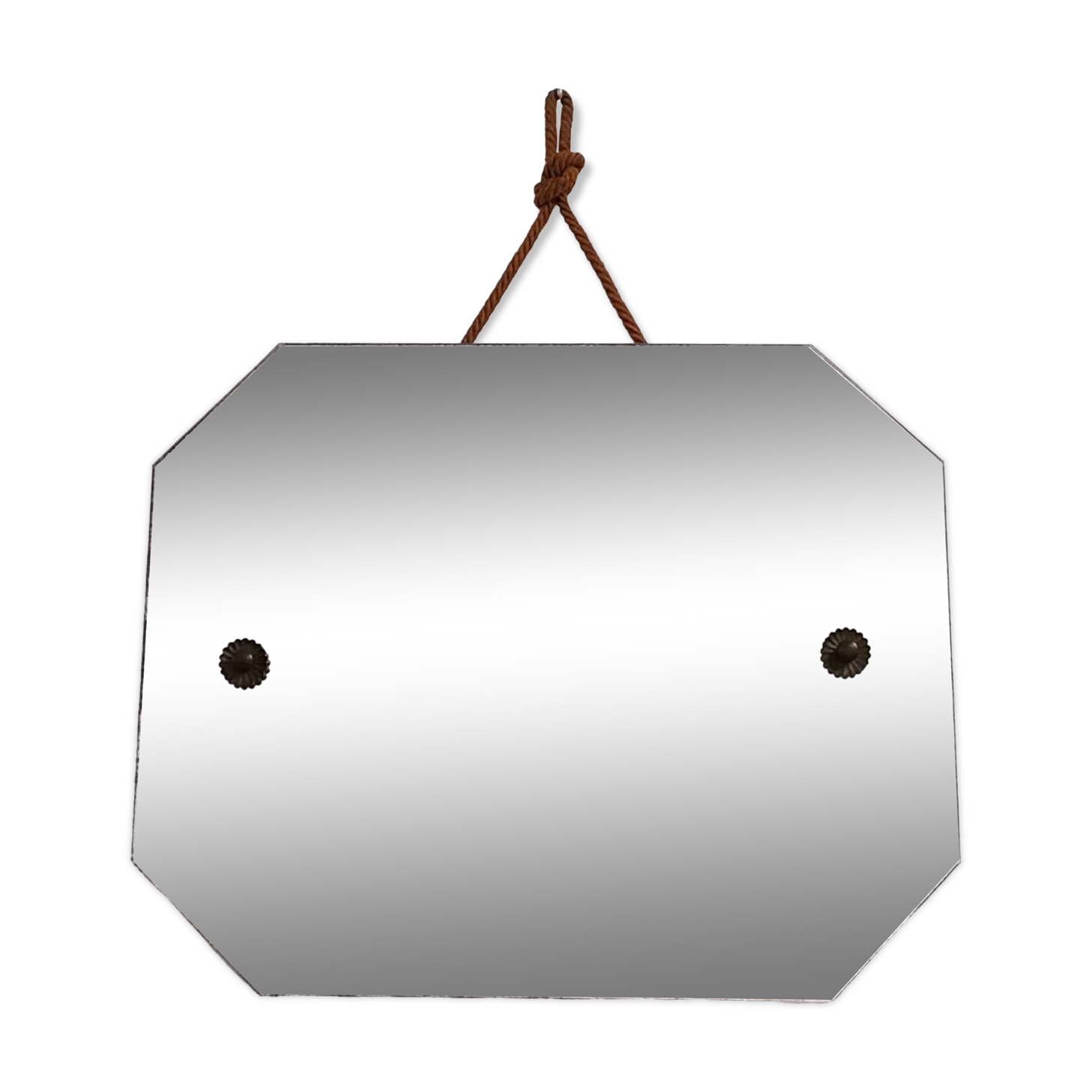 Octagonal mirror with brass hubcaps from the 60s