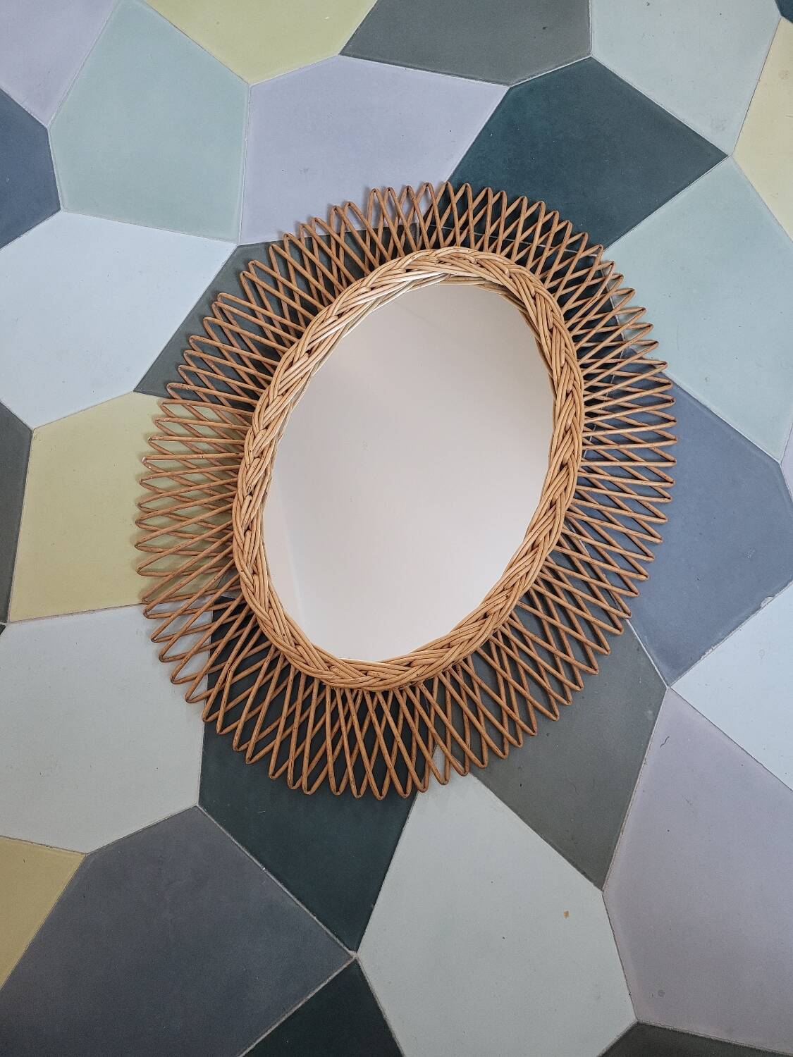 Oval rattan mirror