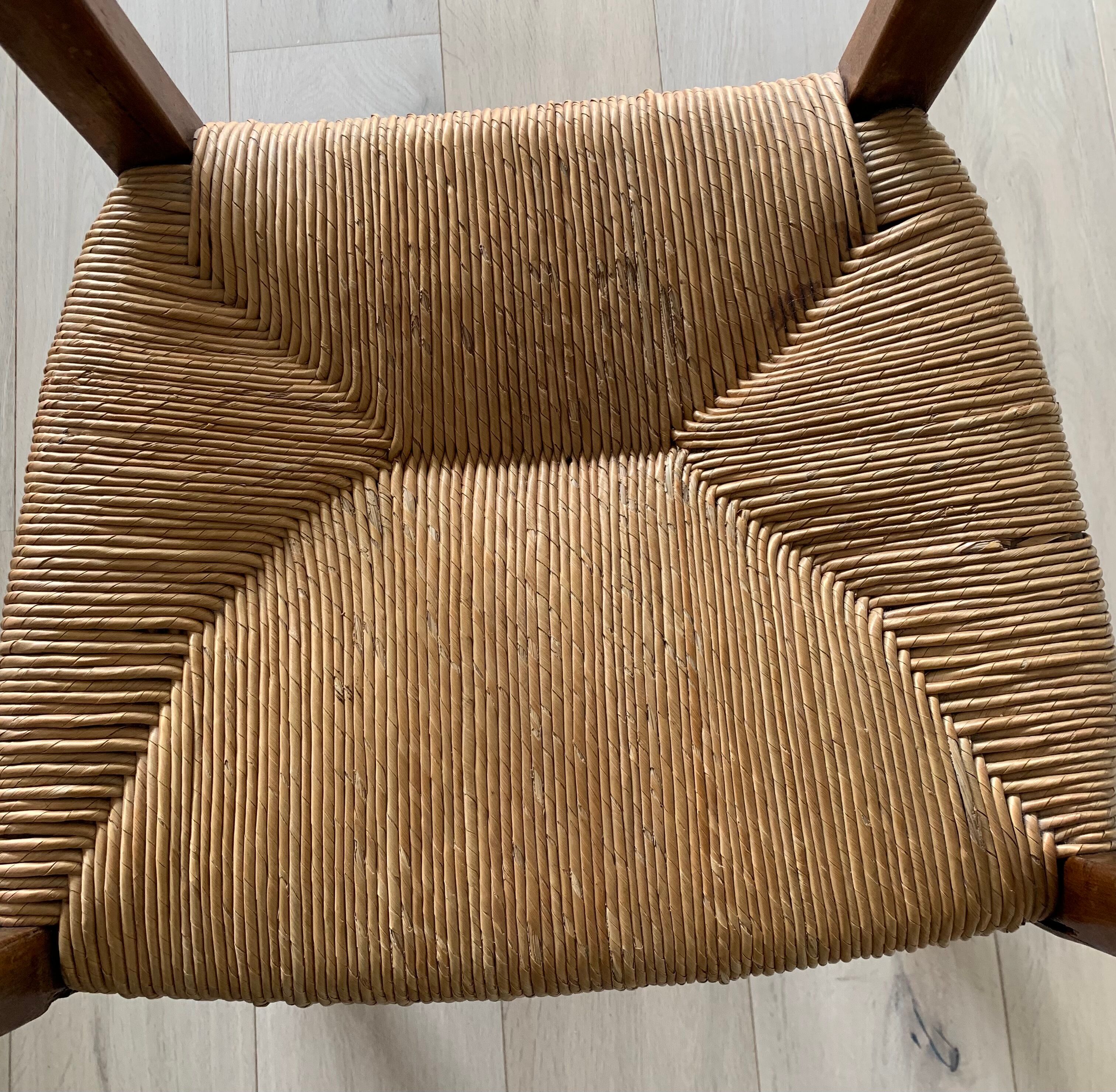Antique wood and straw armchair