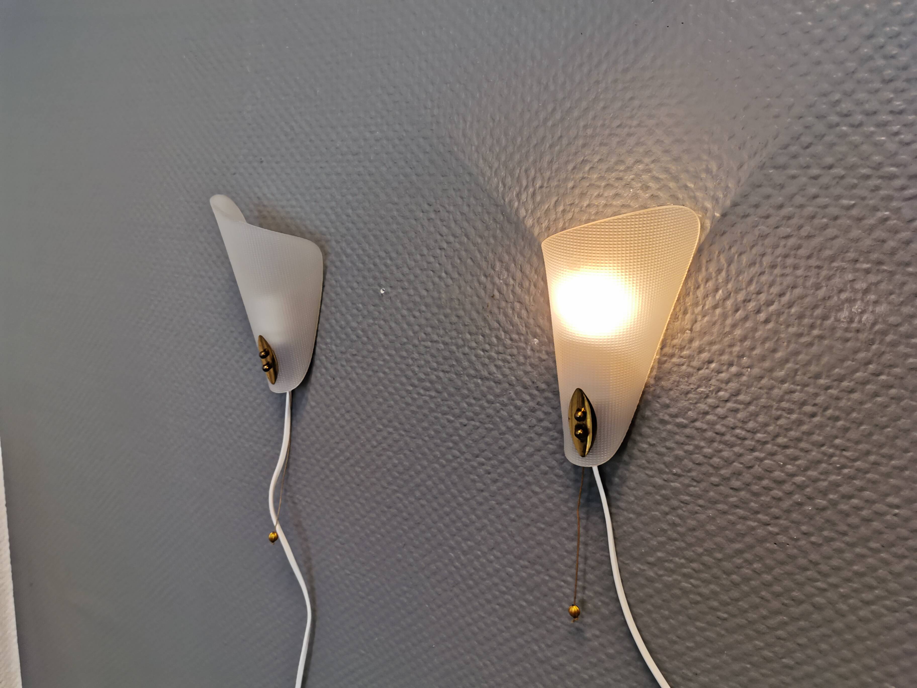 Two small Art Deco wall lights.