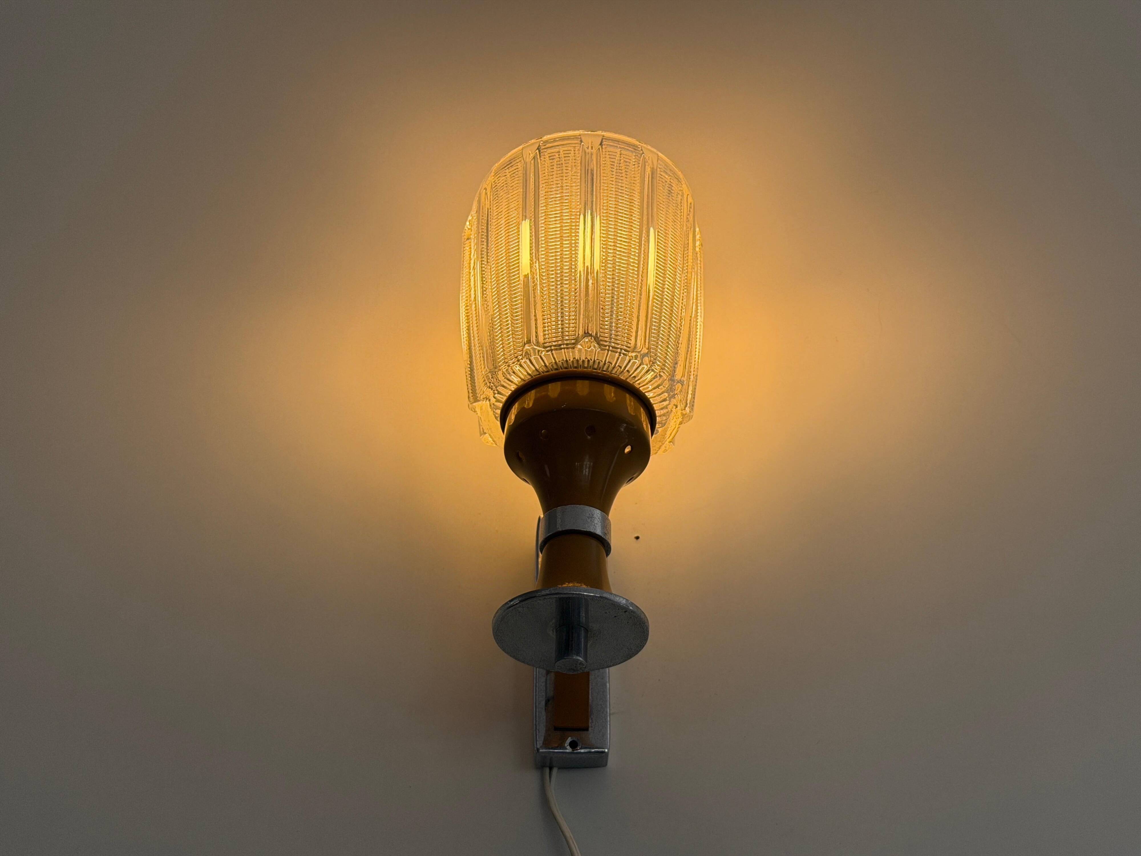Mid-century glass and brown metal wall light, 1960, Italy