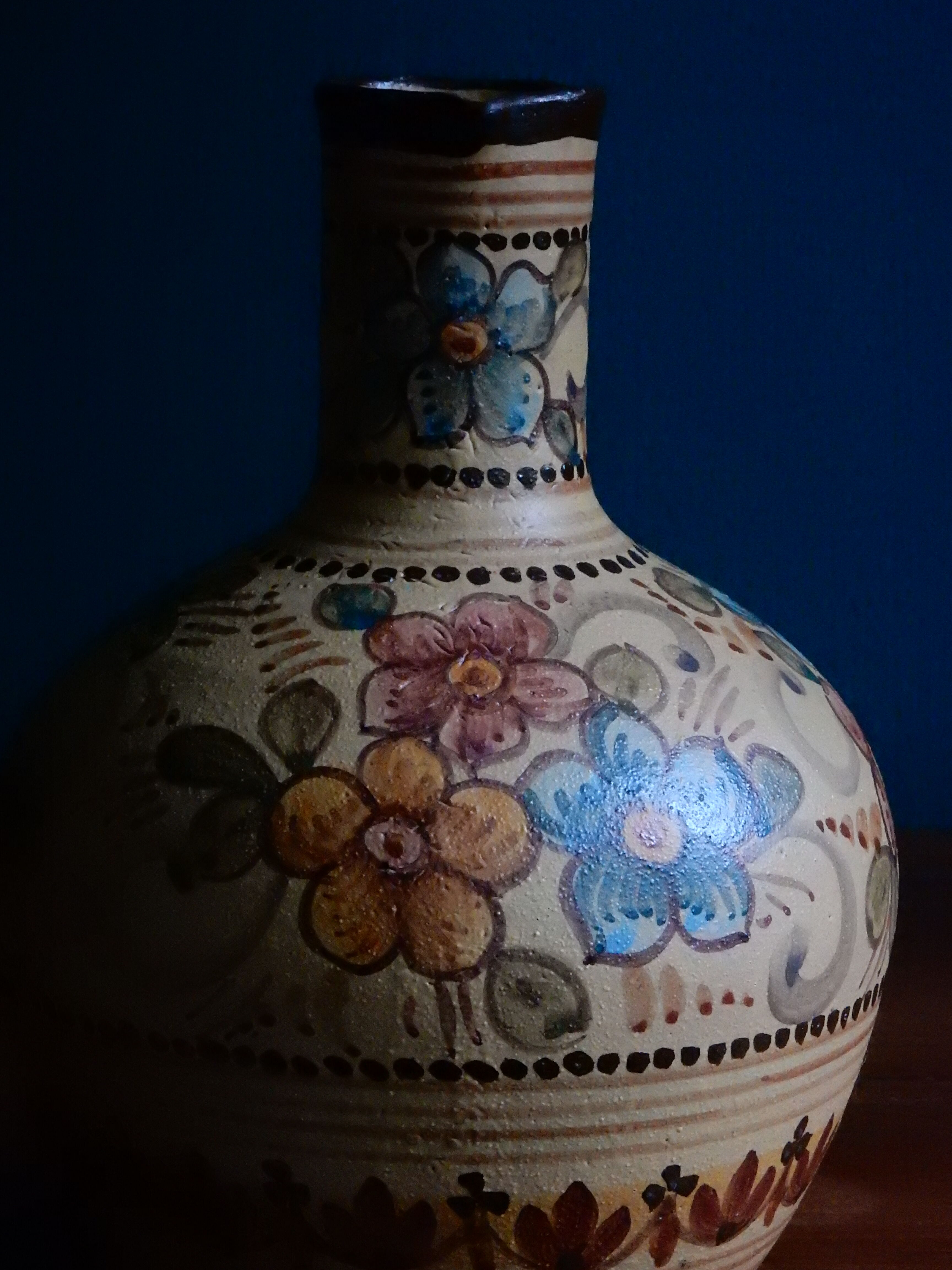 Hand-painted terracotta jug